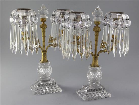 A pair of Regency ormolu mounted cut glass candelabra, height 12.5in.